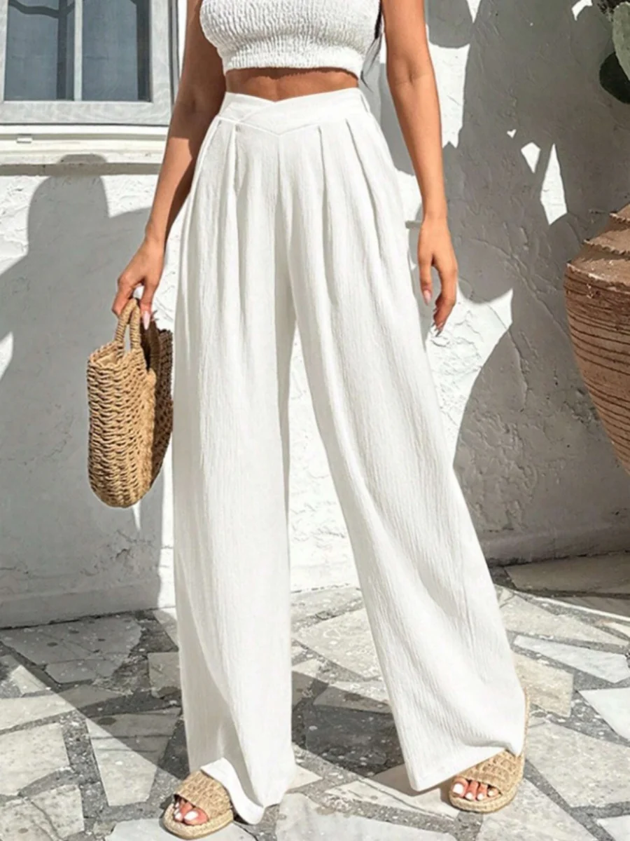 Asymmetrical High-waisted Loose-fitting Trousers With Pleats At The Waist - Image 9