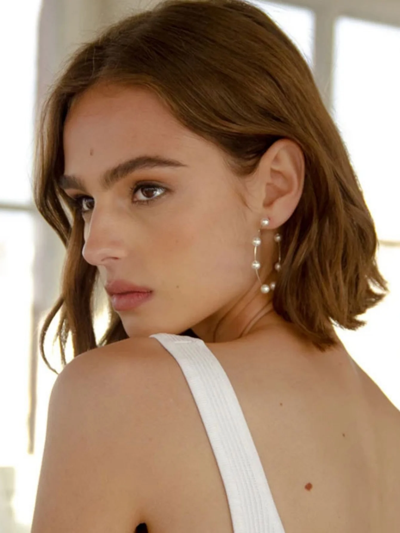 Exaggerated And Unique Round Pearl Earrings - Image 2