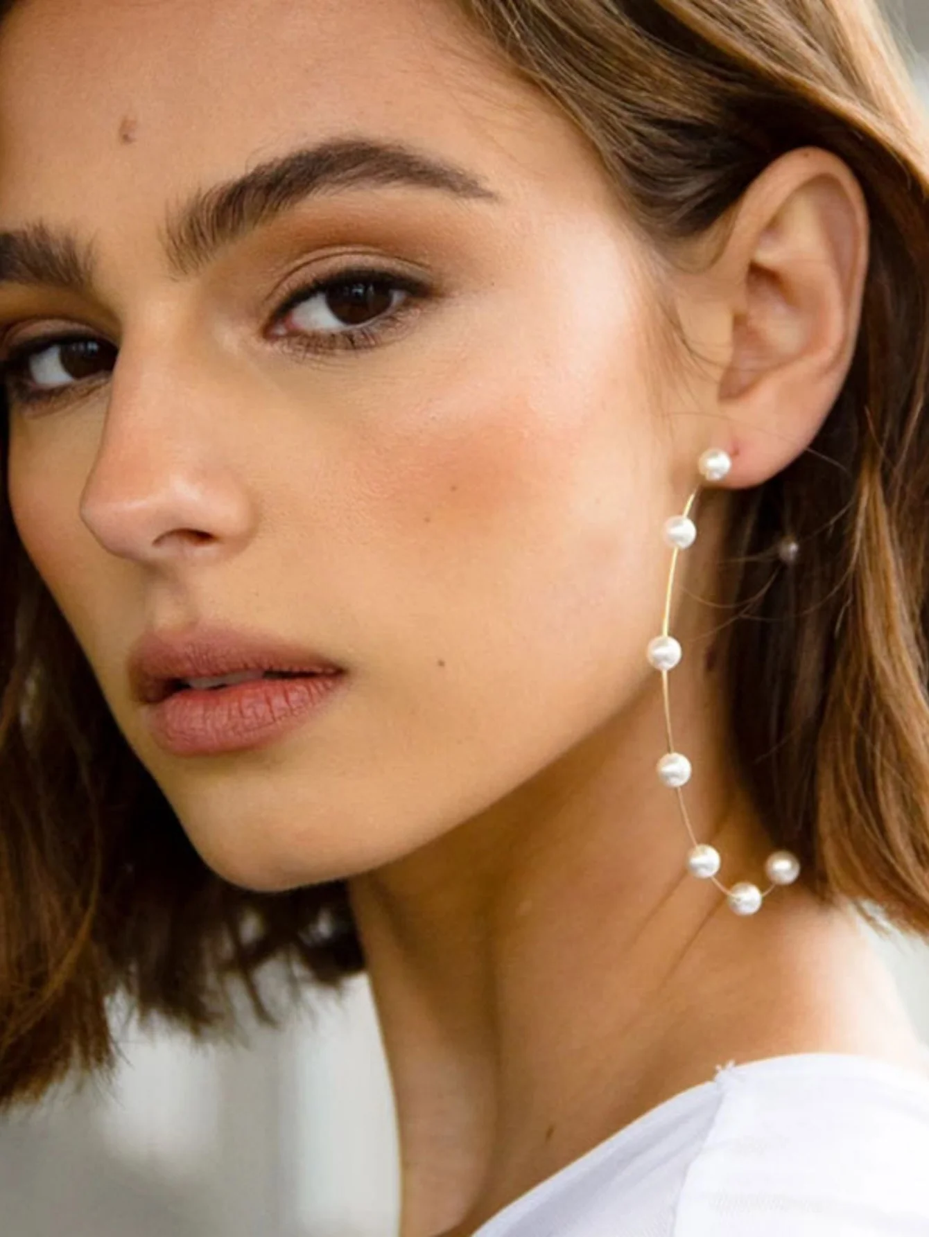 Exaggerated And Unique Round Pearl Earrings - Image 3