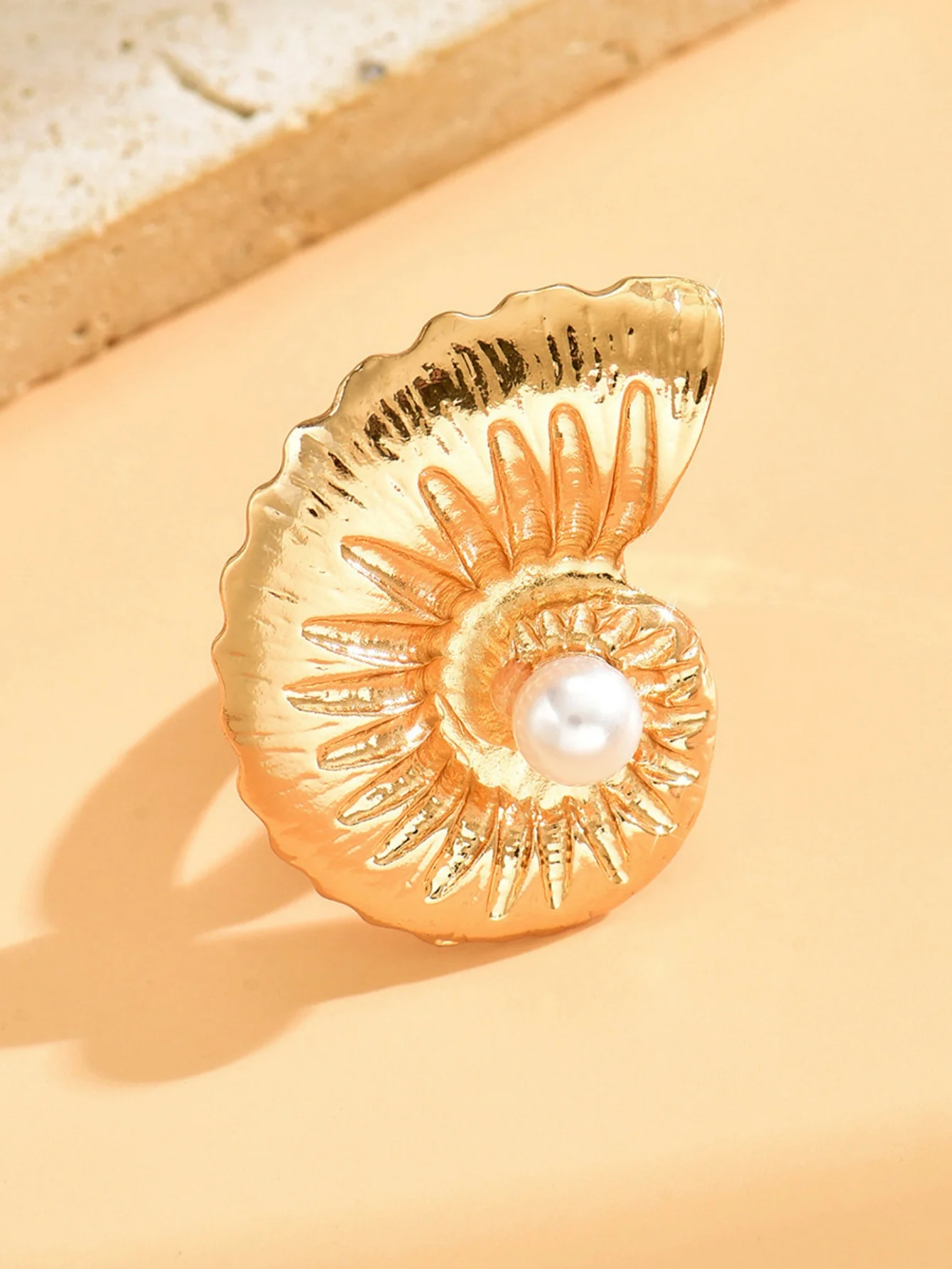 A Ring With An Exaggerated Design Inspired By Conch Shells And Starfish. - Image 10