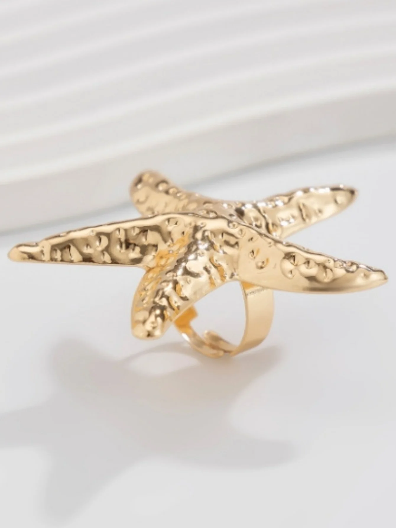 A Ring With An Exaggerated Design Inspired By Conch Shells And Starfish. - Image 13
