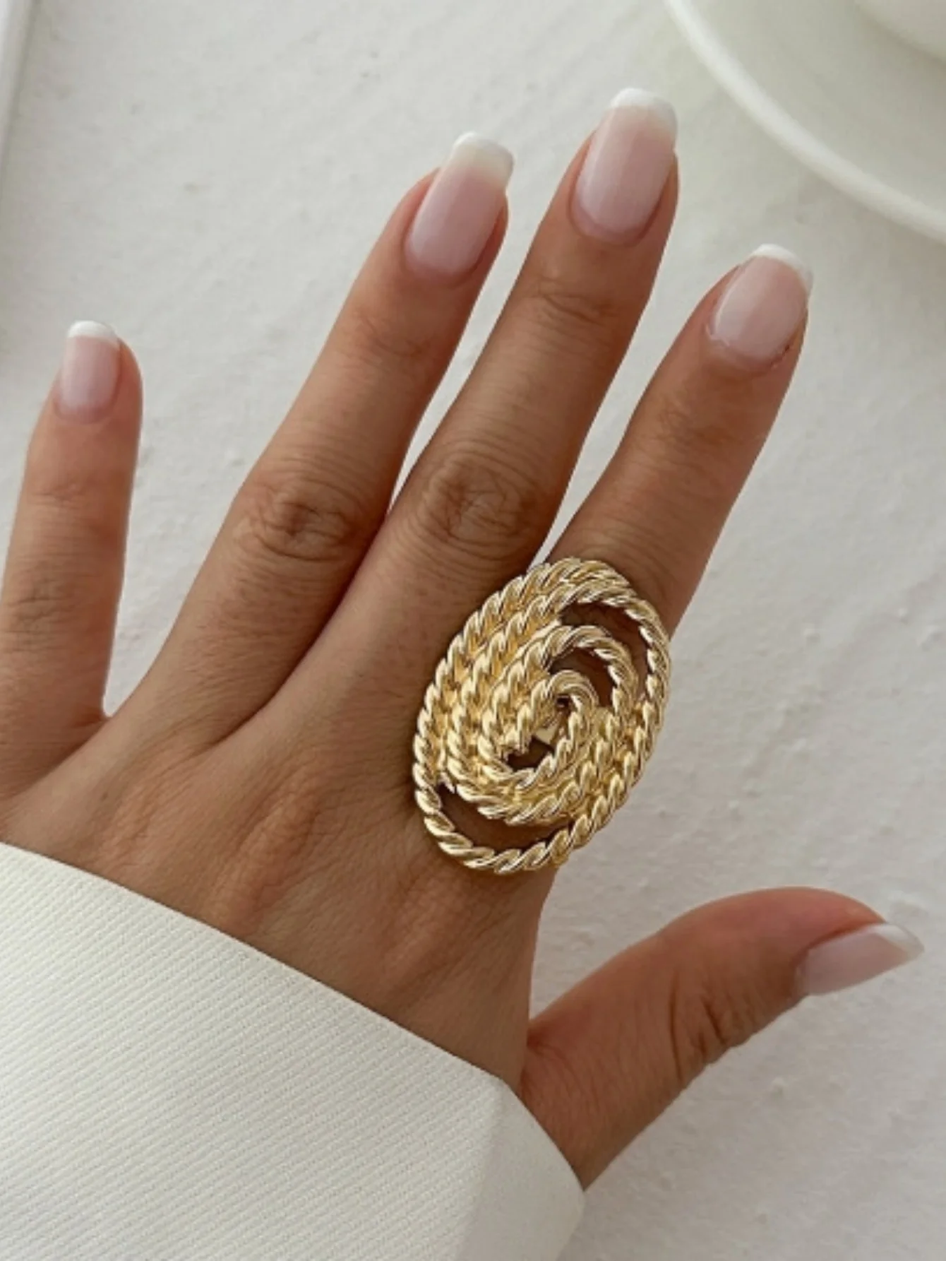A Ring With An Exaggerated Design Inspired By Conch Shells And Starfish. - Image 2