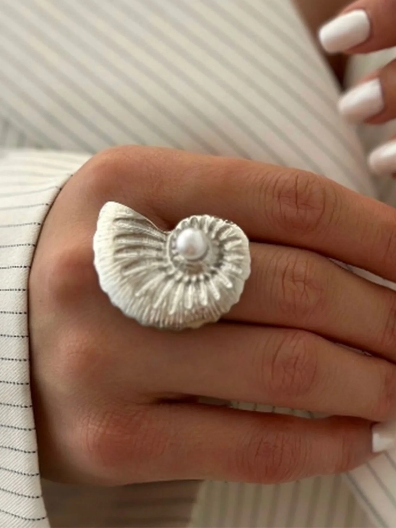 A Ring With An Exaggerated Design Inspired By Conch Shells And Starfish. - Image 7