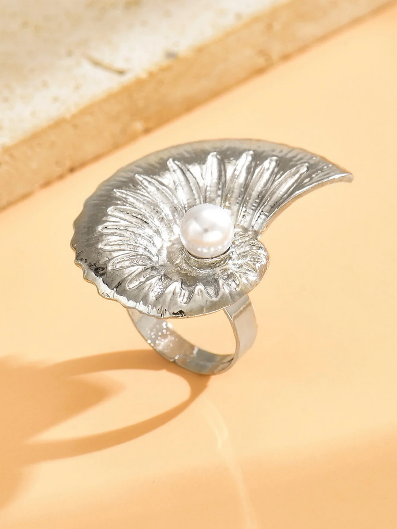 A Ring With An Exaggerated Design Inspired By Conch Shells And Starfish. - Image 8