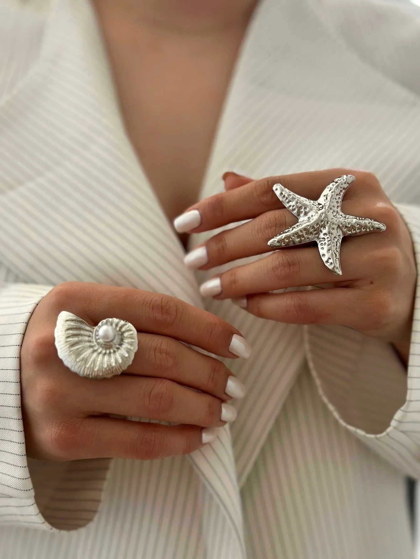 A Ring With An Exaggerated Design Inspired By Conch Shells And Starfish. - Image 9